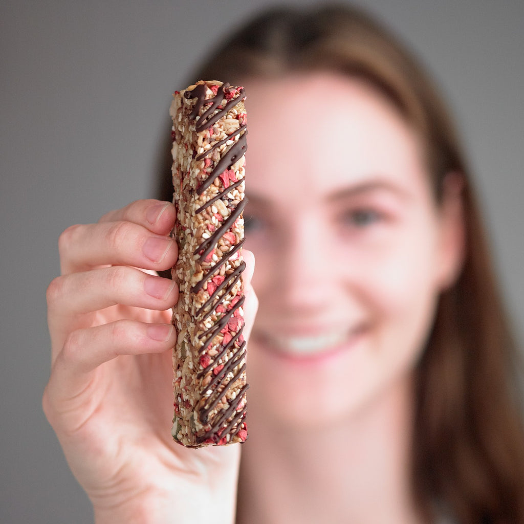 Raspberry Choc Drizzle vitality bar held